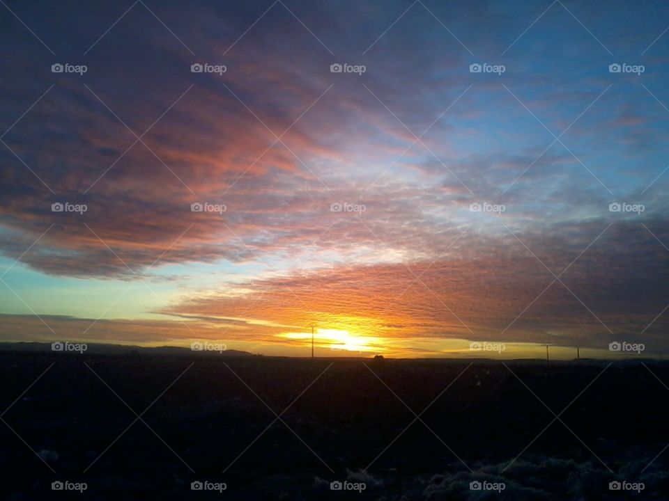 The sky takes on shades of orange during sunset, the colour that gives you hope that the sun will set only to rise again.