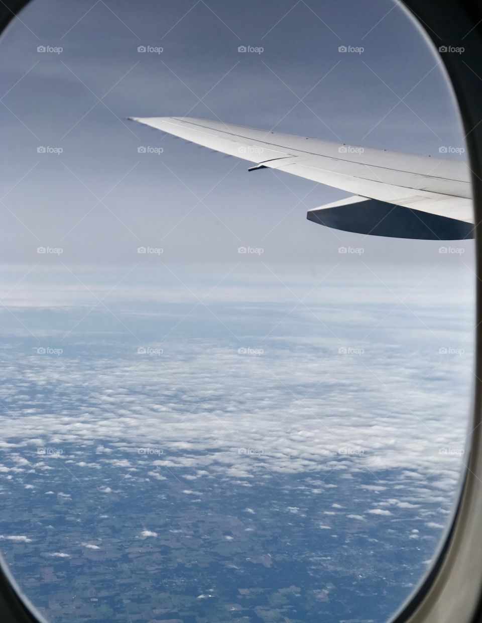 Flying United Airlines Above the clouds over Newark, NJ flying to my next destination