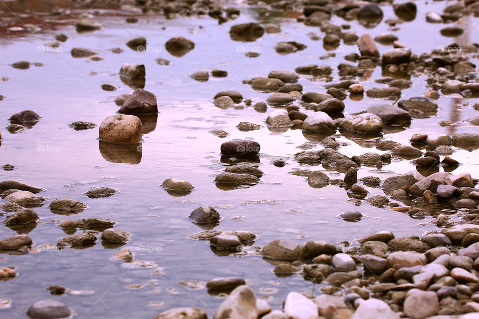Stones reflection on the water