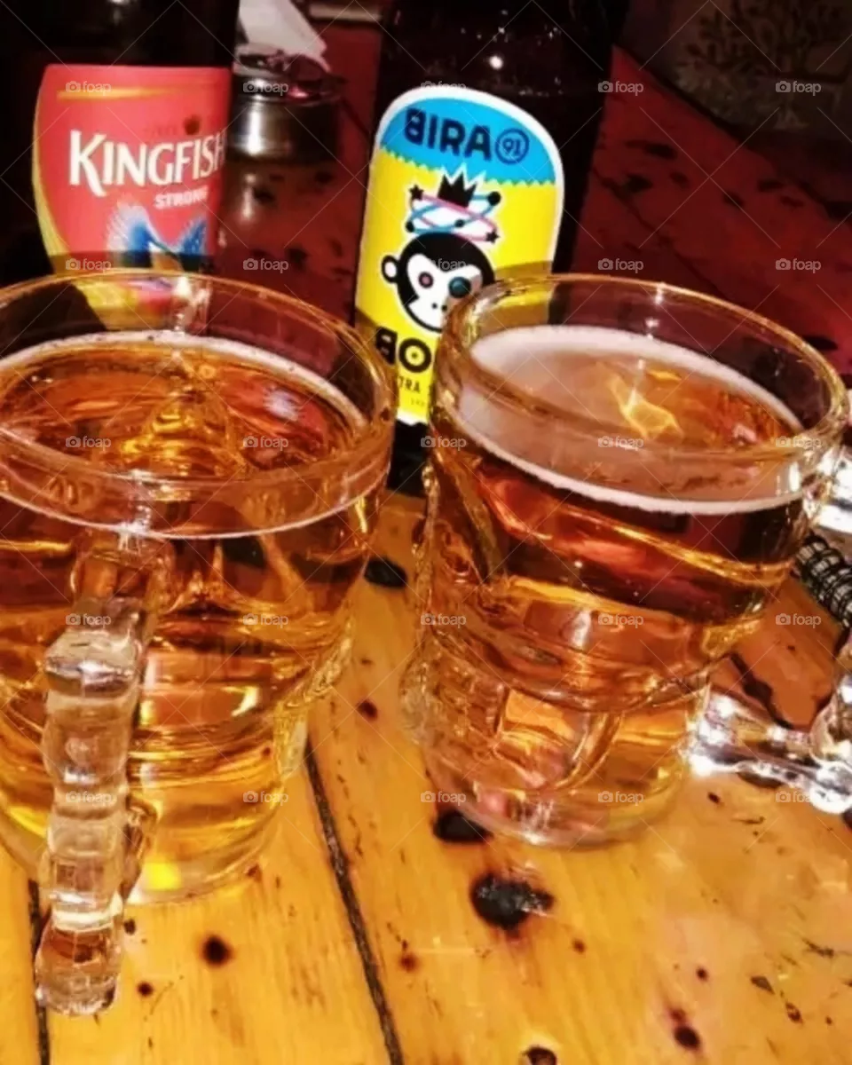 Enjoying a beer with friends in a restaurant.