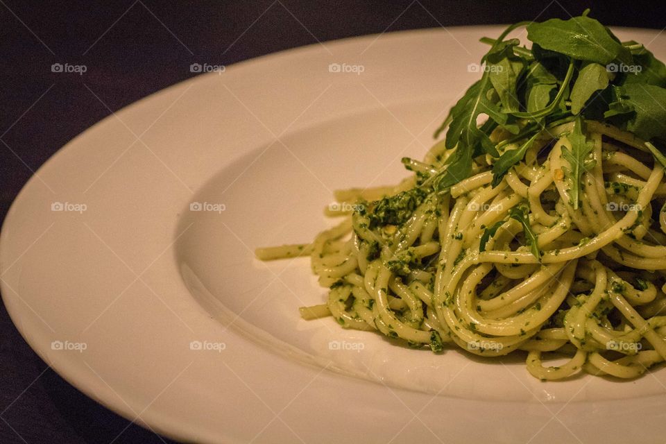 Spaghetti with homemade arugula and lemon pesto