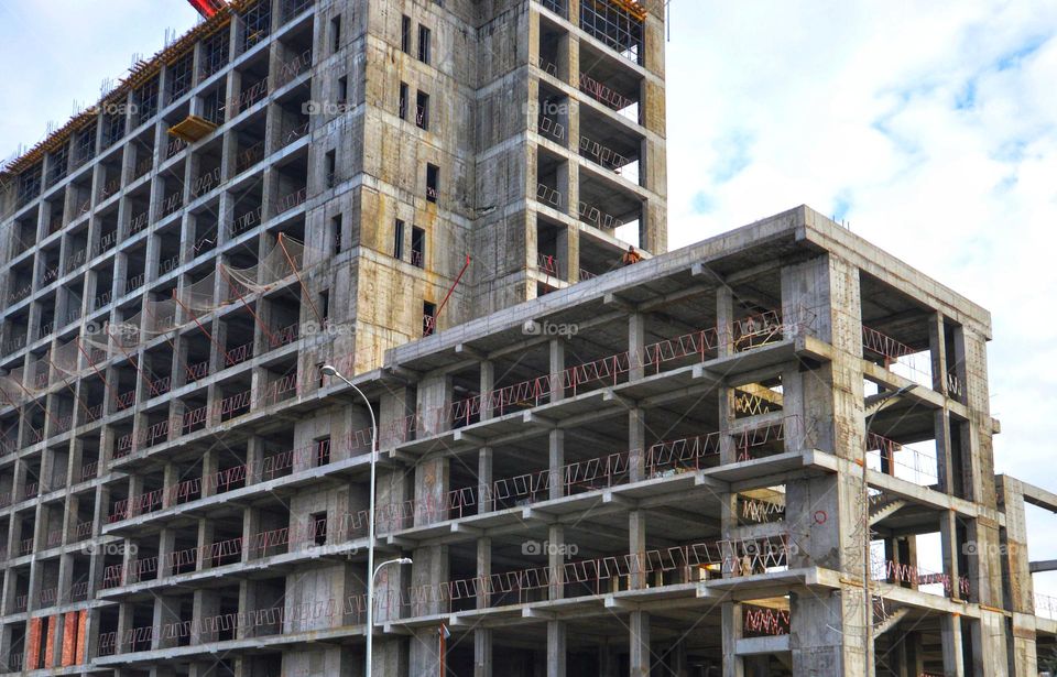 construction in progress of a multi-storey concrete house