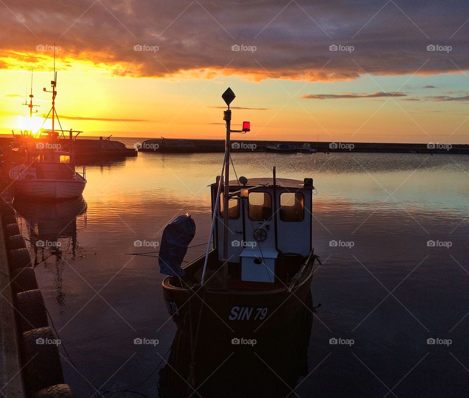 Fishingboat in sunset