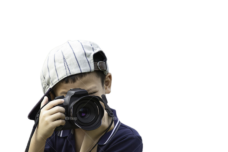 Hand boy holding the camera Taking pictures on a white background.