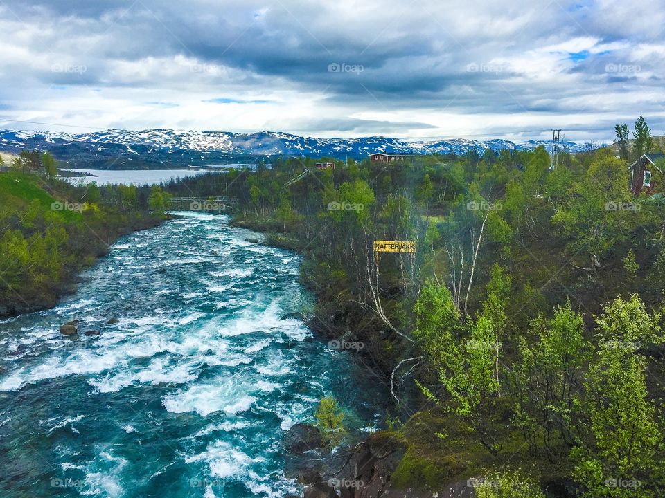 Snowy mountain and river falls