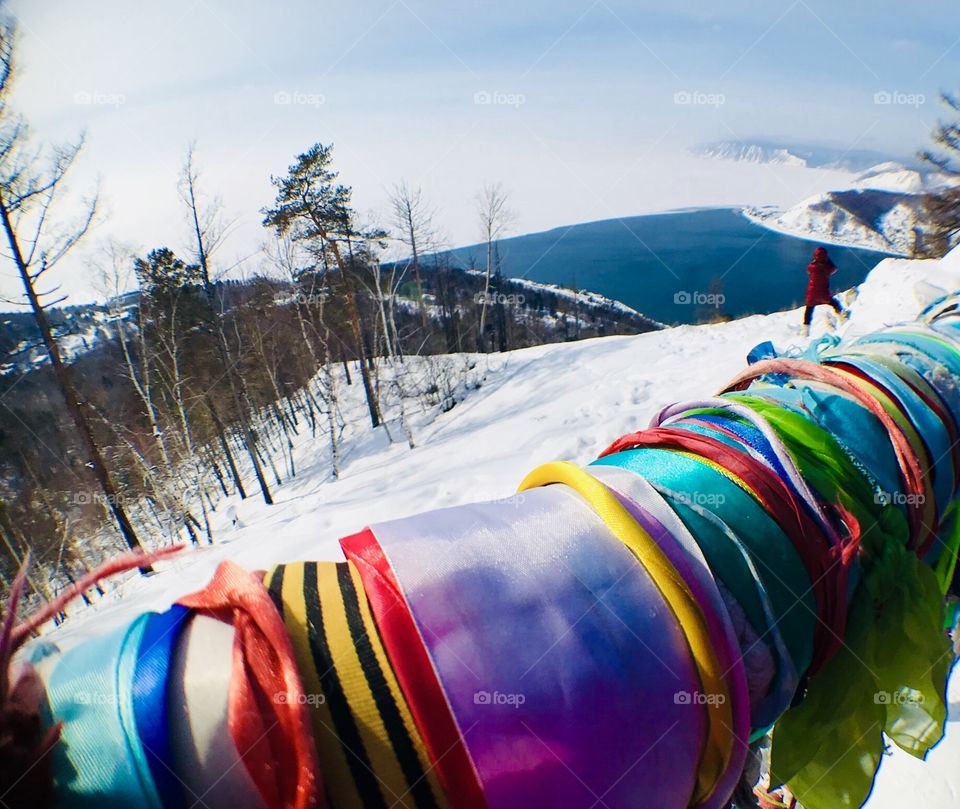 Colorful clothes on railing in Baikal Lake Russia