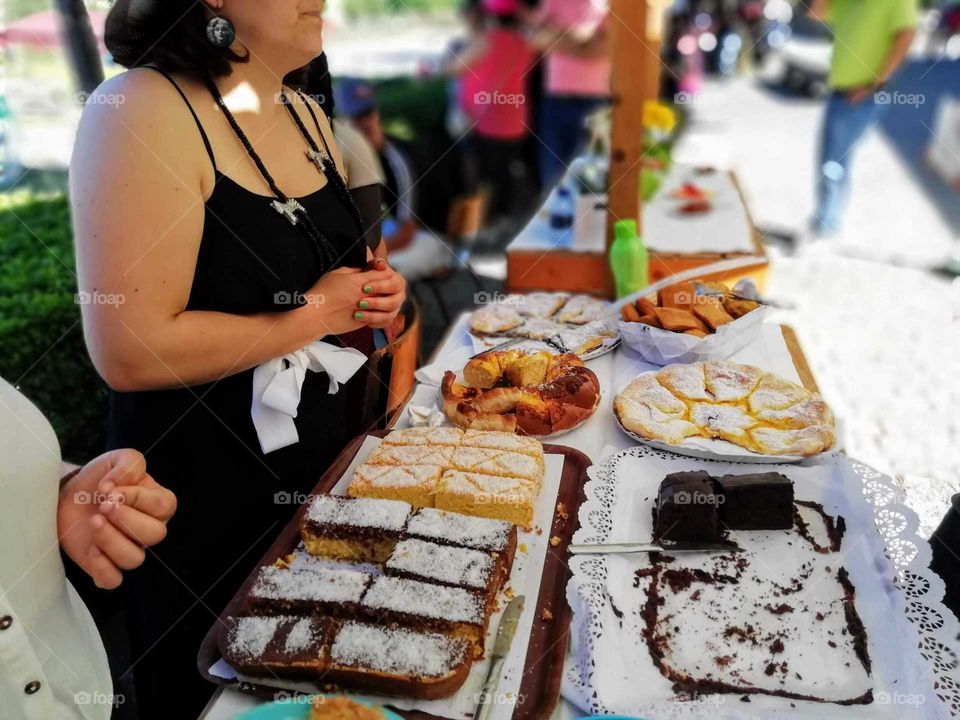 Selling homemade cakes at a summer fair