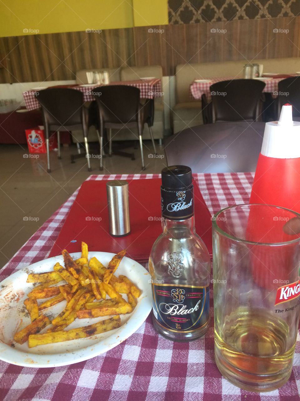Black label with French fries Indian style 