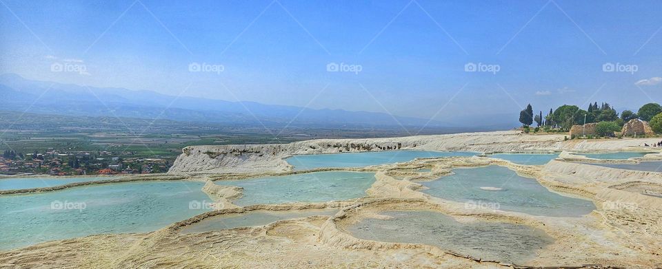 beautiful cascading pools of mineral springs in Turkey higheropolis Pamukkale