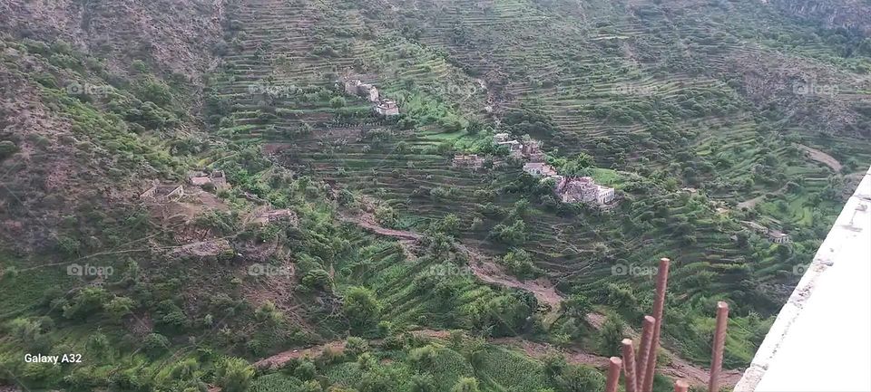 Glory be to God, the magnificent and picturesque view and the natural green trees are a view that is nothing more wonderful than it