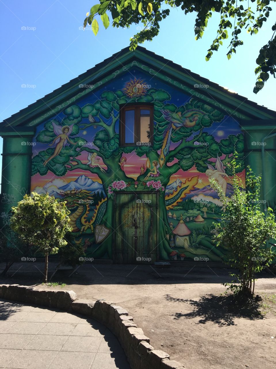 Artwork on a building while entering the freetown of Christiania in Copenhagen, Denmark. Summer 2016. 