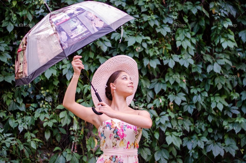 Pretty Young Girl Posing with Umbrella