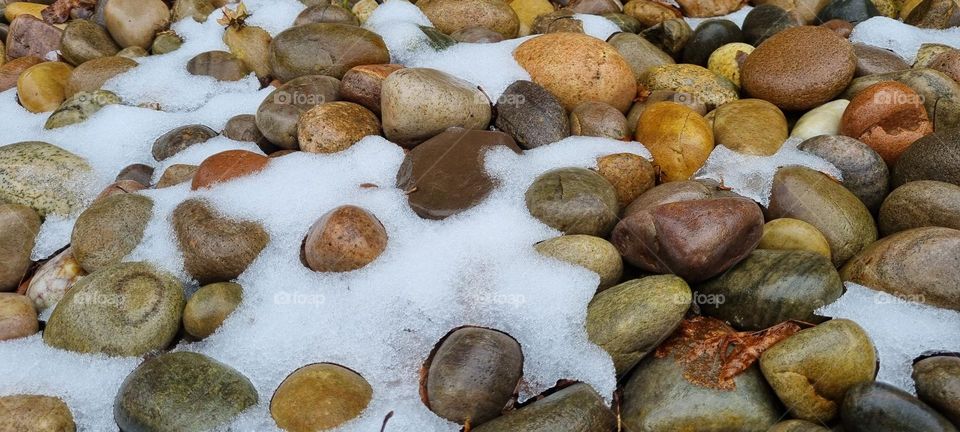 frost on pebbles and stones