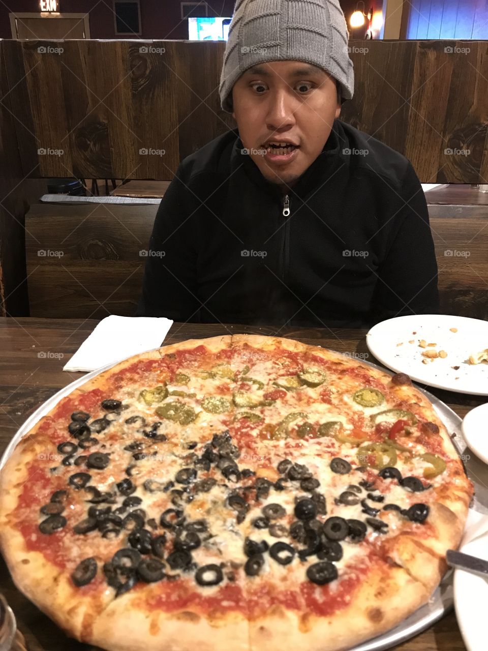 Huge pizza with lots of surprise toppings 