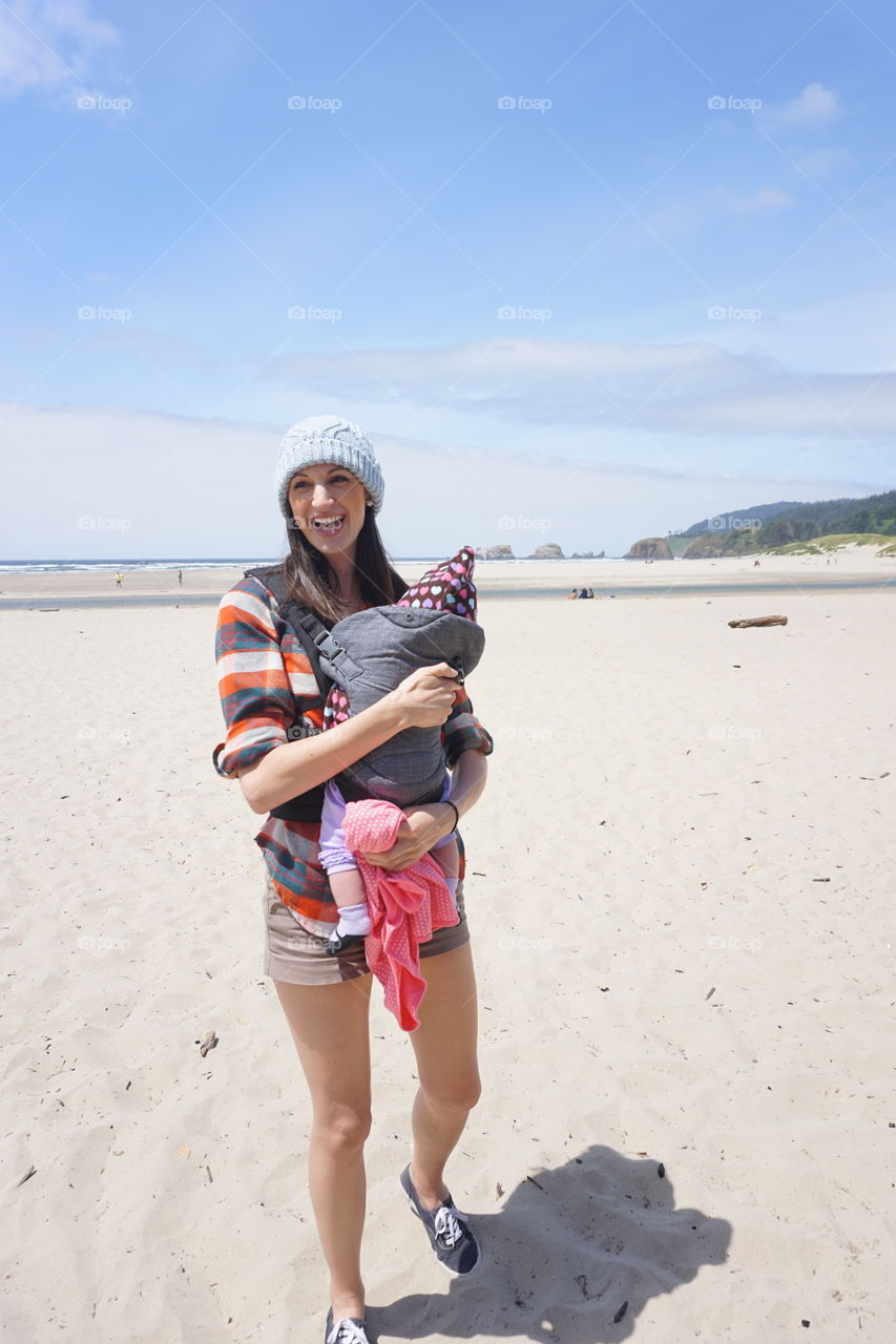 Beach Baby. 4 months old & her first time to the beach. Thanks to the Oregon Coast for the perfect weather.