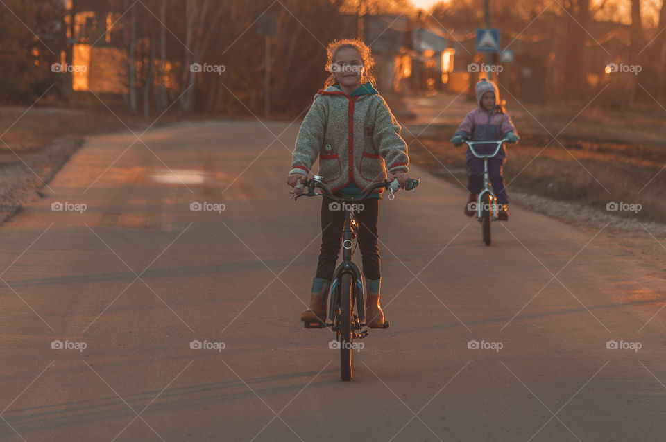 Kids riding bikes