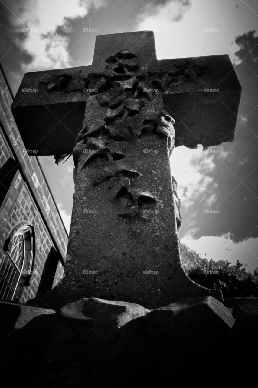 A very old cross marking the place of an ancient soul.