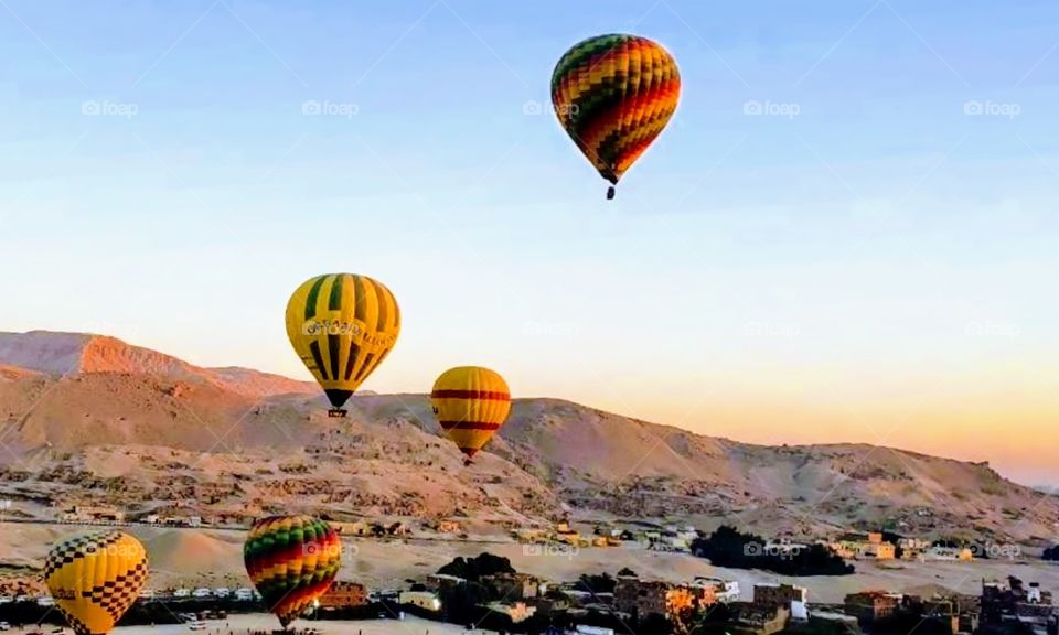 Five colorful balloons