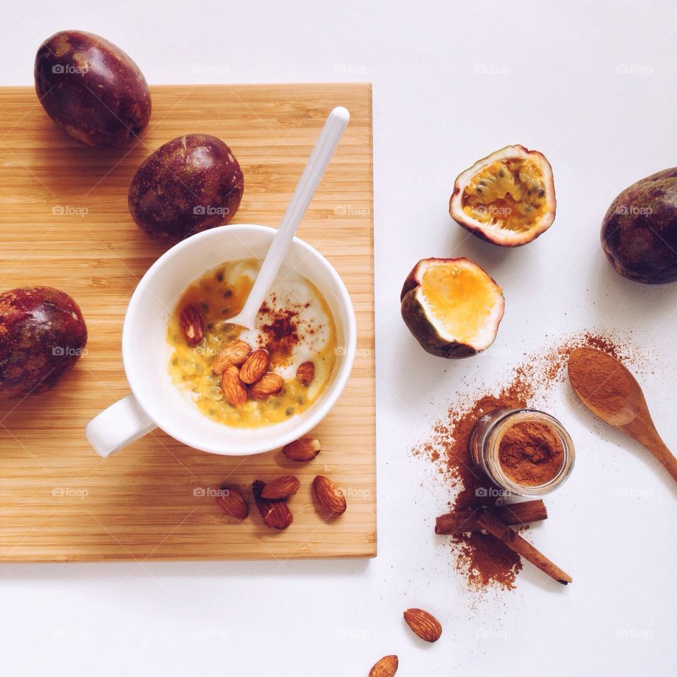 Healthy breakfast with passion fruits and yogurt