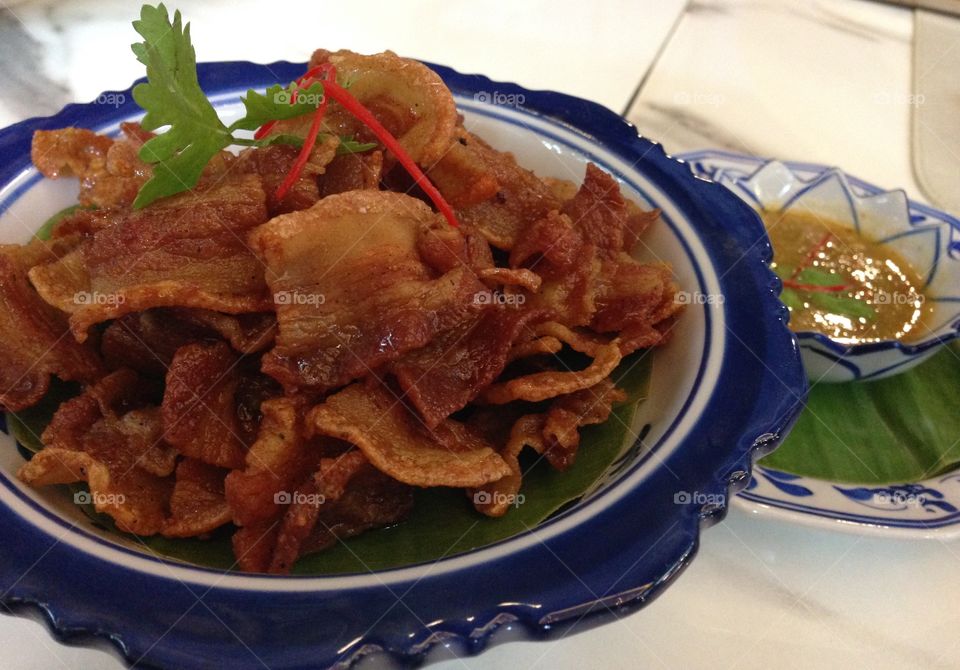 Pork belly fried with fish sauce
