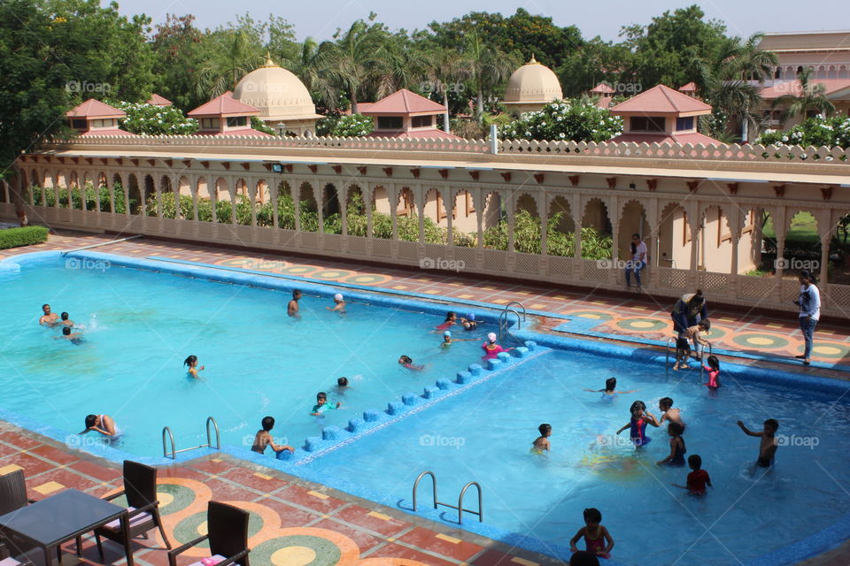 kids enjoy in the Swimming pool