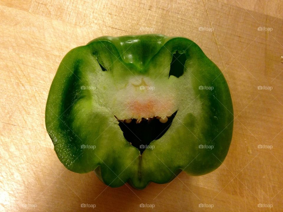 Angry food . I was cutting this pepper while making dinner one night...this 'face' surely screams, "Don't eat me!"