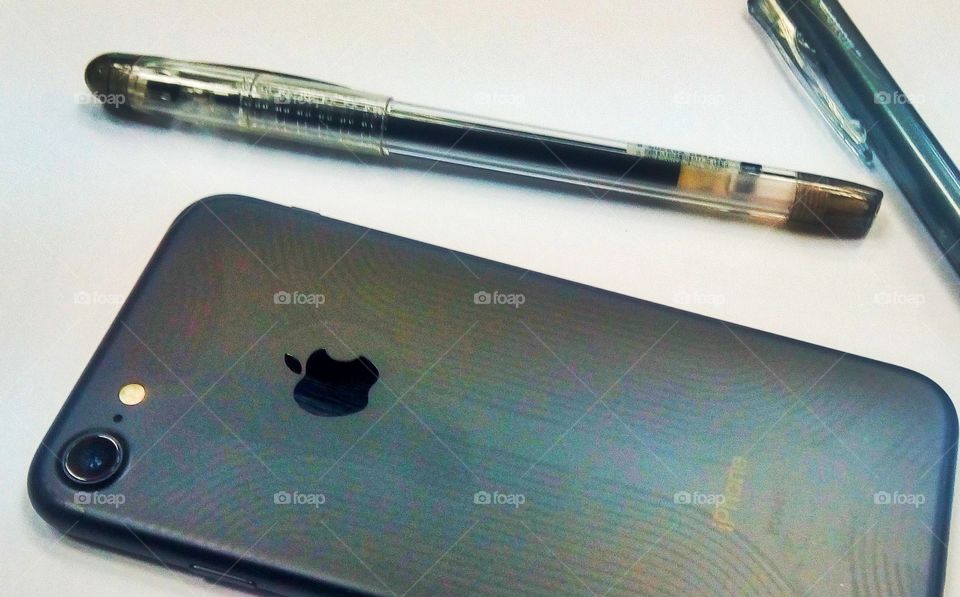 iPhone with pens
