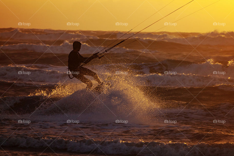 Surfing at Sunset. 
