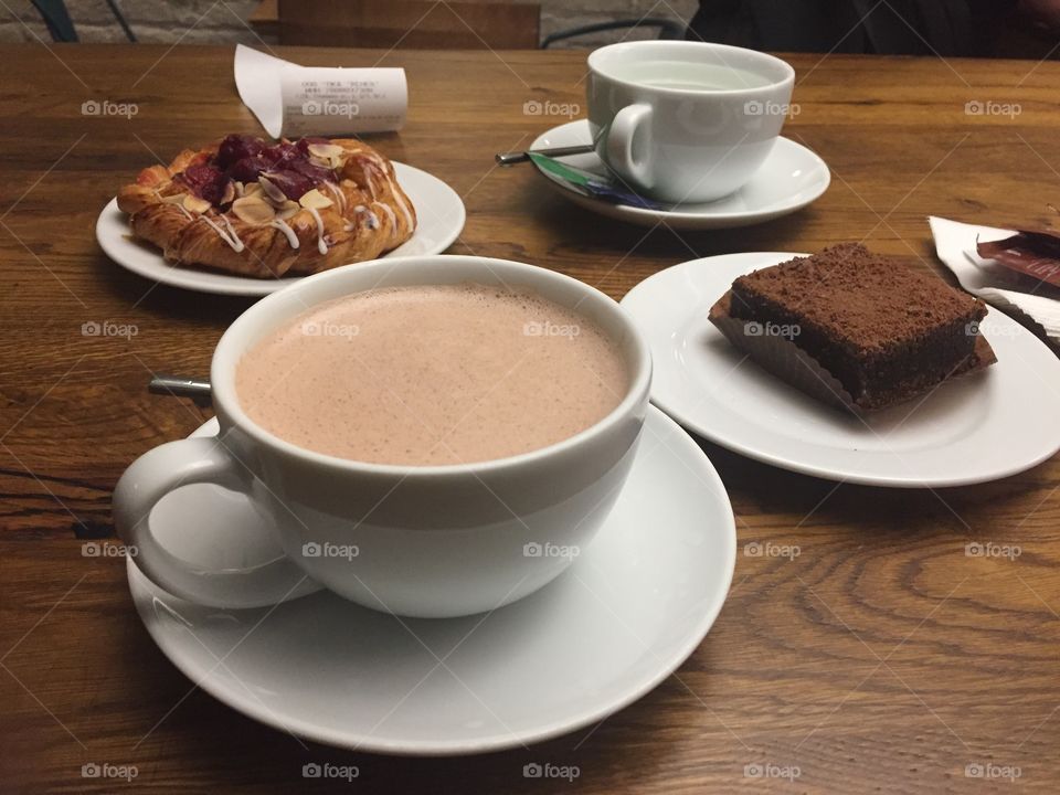 Hot chocolate with brownie in a perfect cold evening.Best foods for a cold evening.love story of foods 