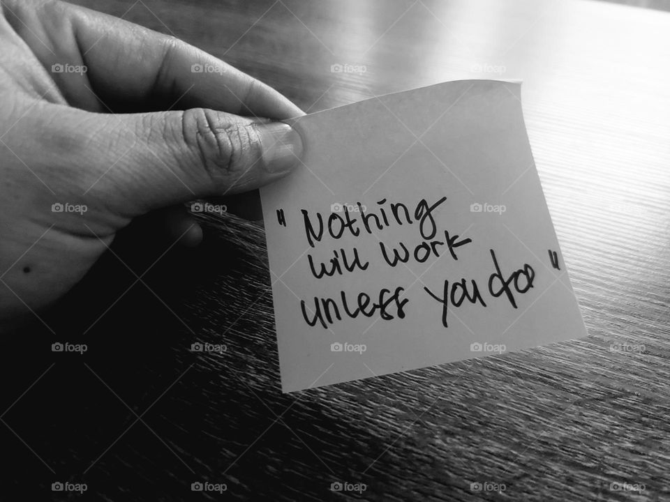 Motivational quotes on a small piece of paper