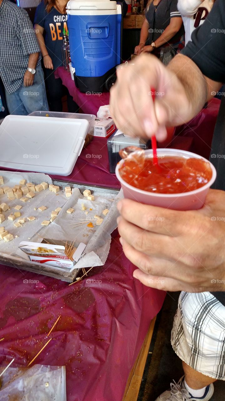 making bloody Mary's  at the Burgoo festival at Skoogs bar and grill