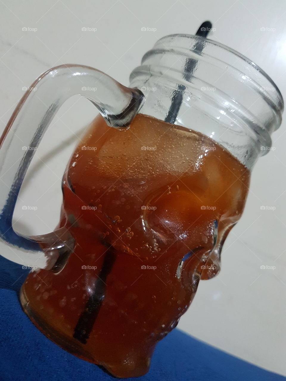 An icve sold drink in a skull mug