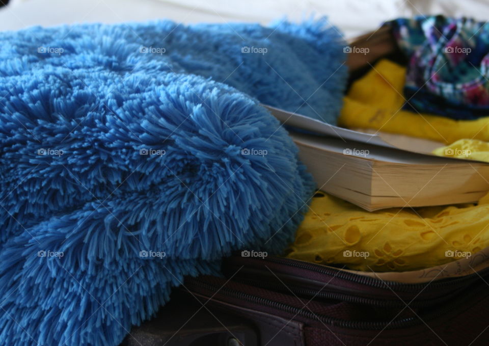 Packing. Packing my favorite blanket and a good read. 