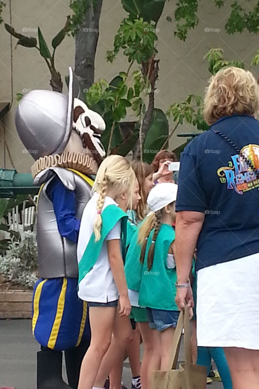girl scouts at disneyland California watching a show