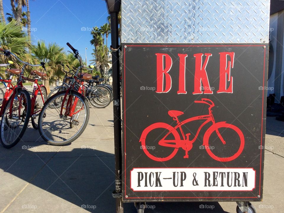 California bike rental spot. Blue skies. Red pop. Graphic signage. Venice Beach area. Taken November 2016.