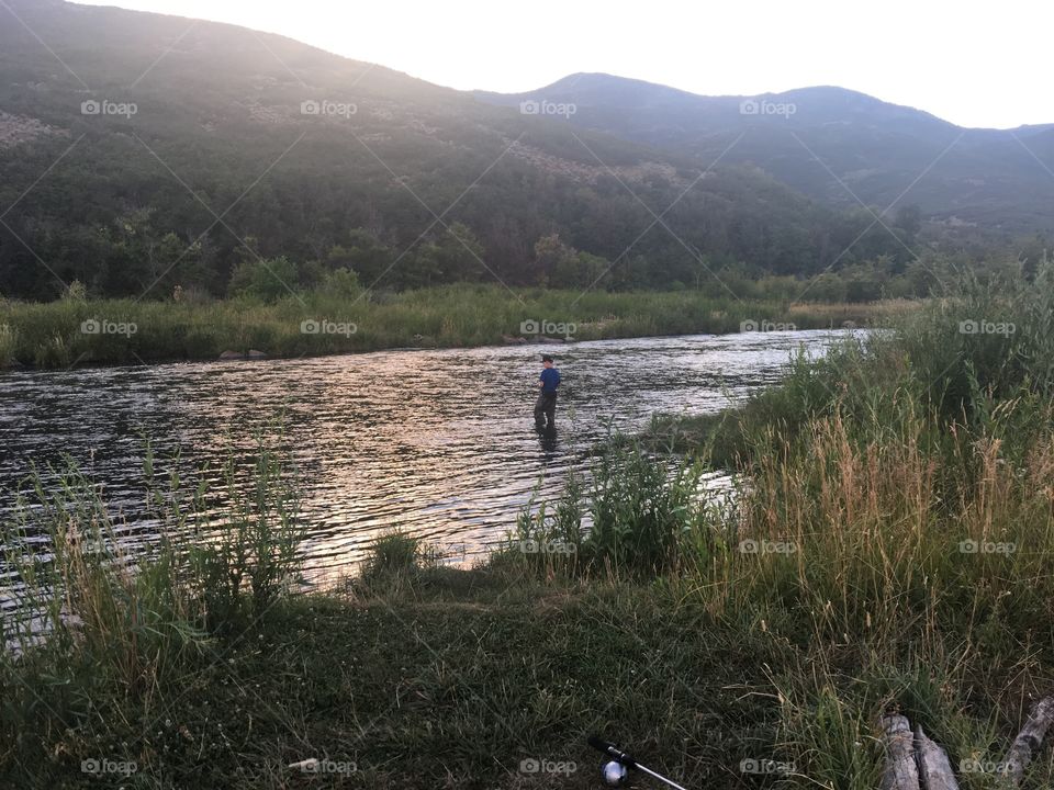 Fishing on the provo river.  Wasatch mountains.  Trying to catch the big one!! 