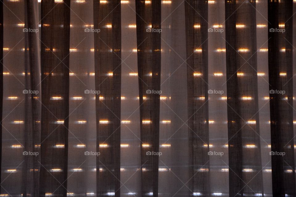 Venetian blind and a curtain