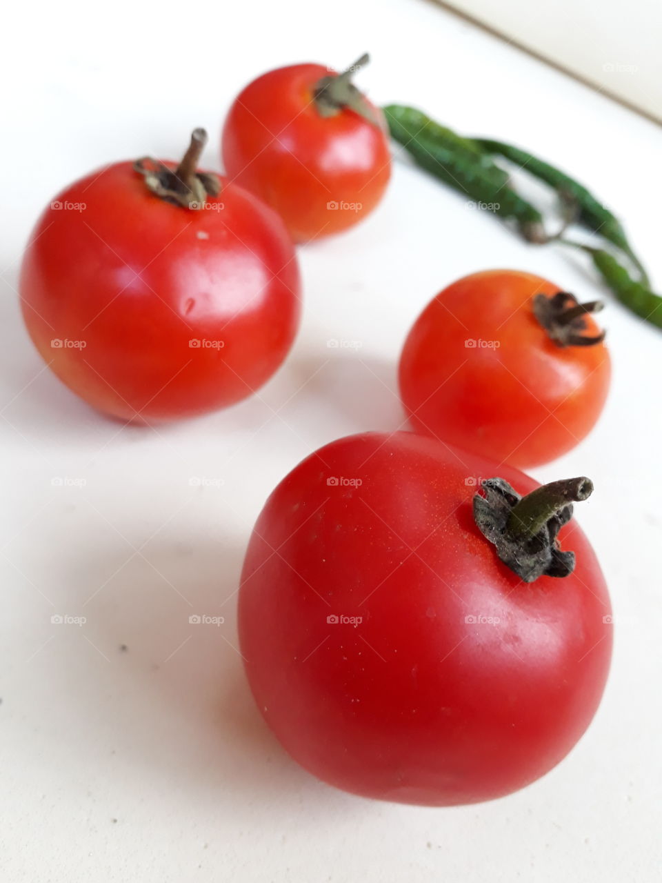 red tomato mad green chilli