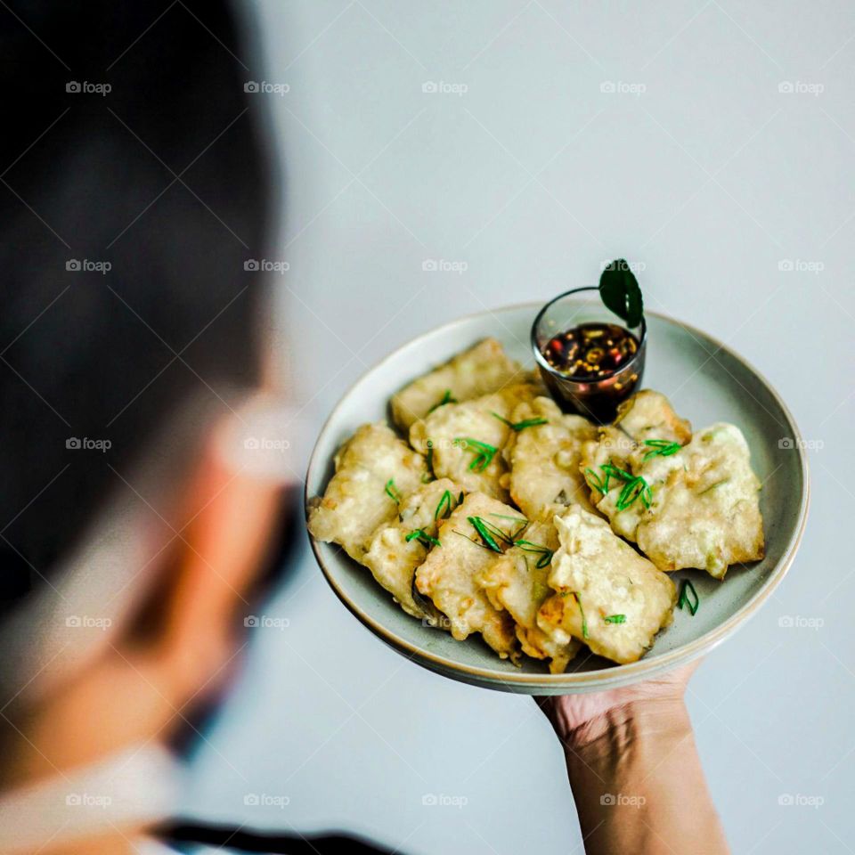 Your order has come! Flour fried soybeans topped with celery combined with soy sauce chili. Spicy. Sweet. Savory. Salty. Crispy. Warm. Food. Eat. Snacks. Cafe. Servant. Delicious. Order. Nutritious.