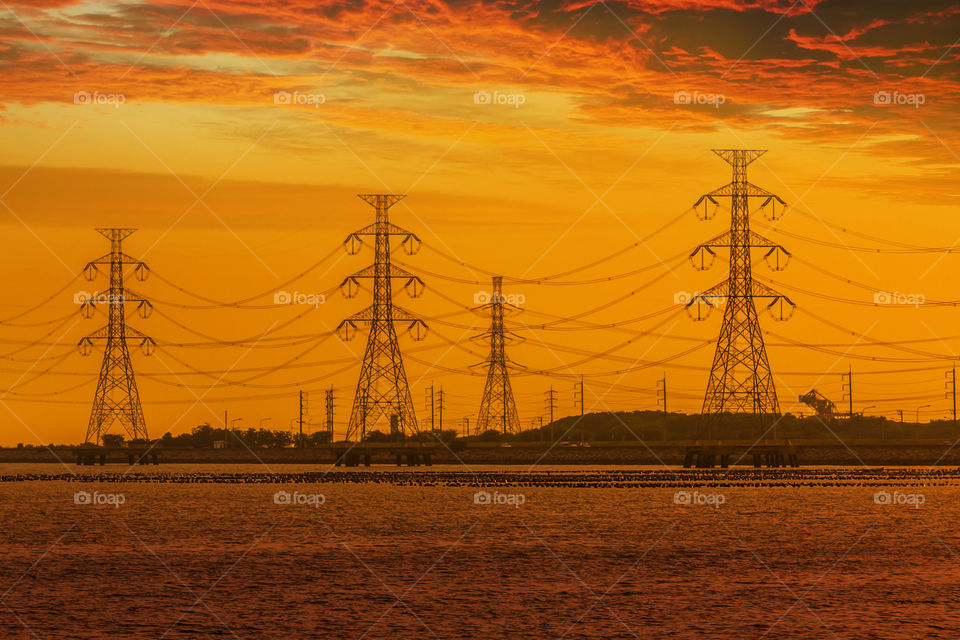 Electric tower with sunset