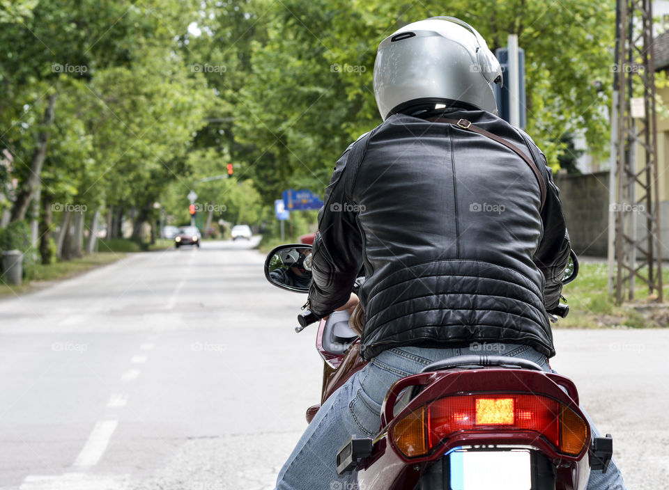 motorcyclist on his bike