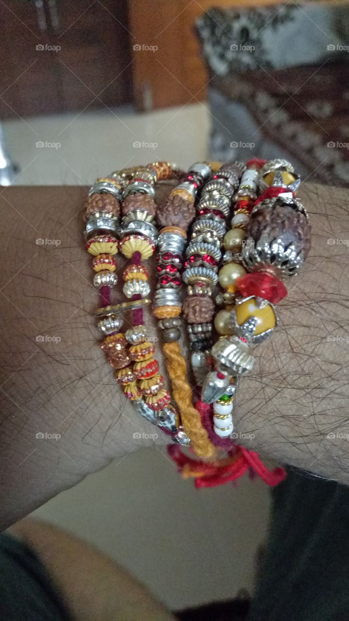 Rakhshabandhan festival, which sister bind colorful band on brother's hand