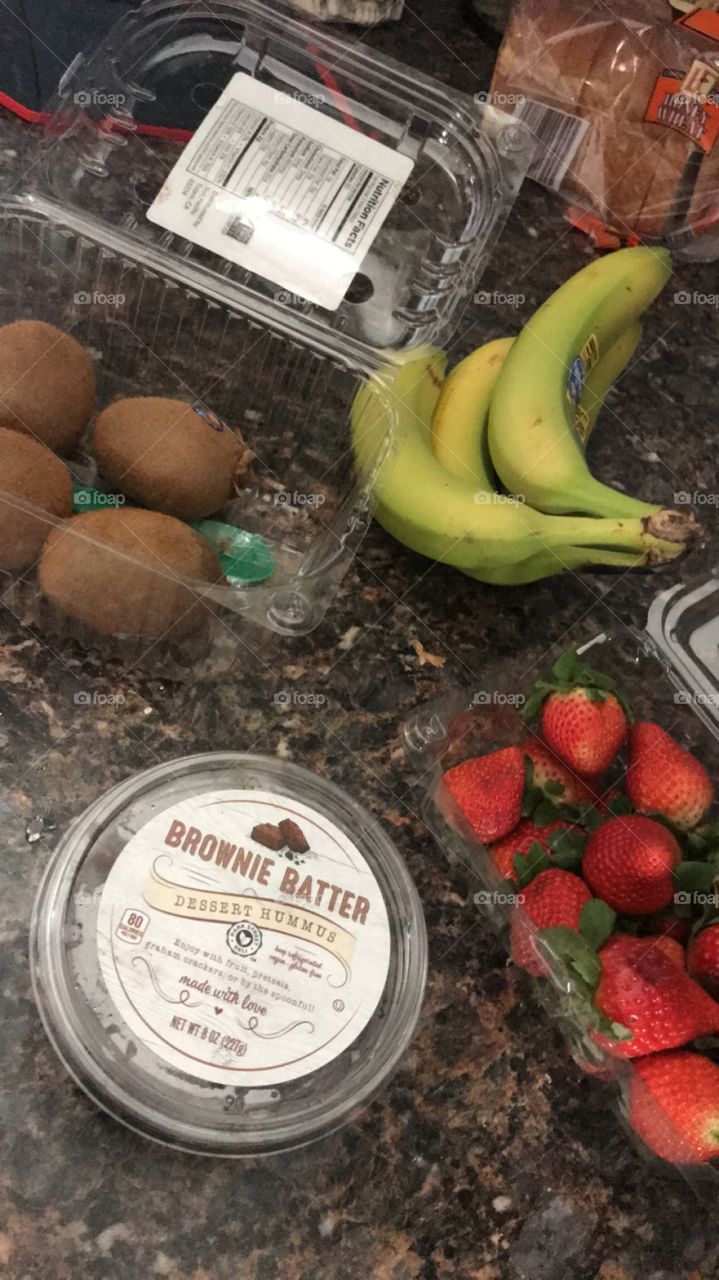 Brownie batter dessert hummus. Bought at aldis. Chocolate covered fruit? I’ll take it! #aldis #browniebatter #hummus #bananas #kiwi #strawberry #yummy #giveitashot #healthy #sogood