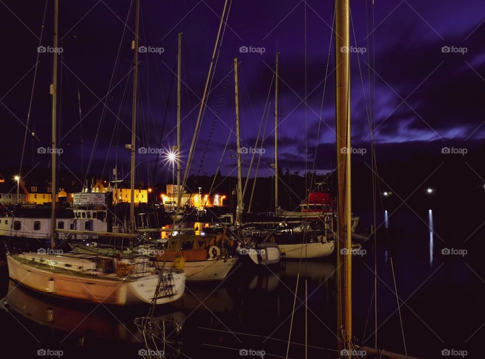 Boats in a shipyard at night, docked for the night, boats in Scotland, a Scotland shipyard, nighttime photography, long exposure photography 