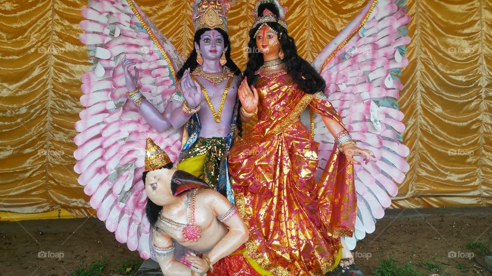 God Vishnu and Goddess Lakshmi riding on Garuda bird.In this new year, I have done a deed that I should keep a good idol every day so that people can get the idols and make a good idol in May exhibition.