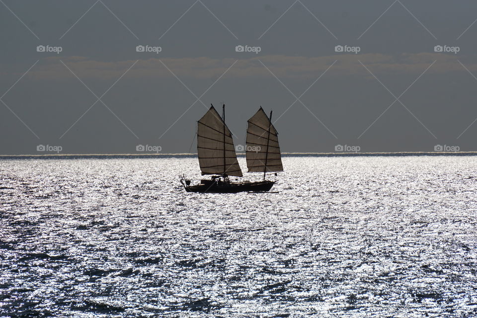 Chinese junk at sunset