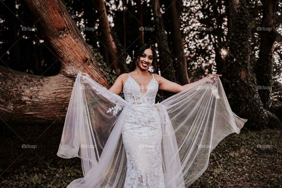 Wearing my flared detached wedding dress with giant trees in the background makes me happy.