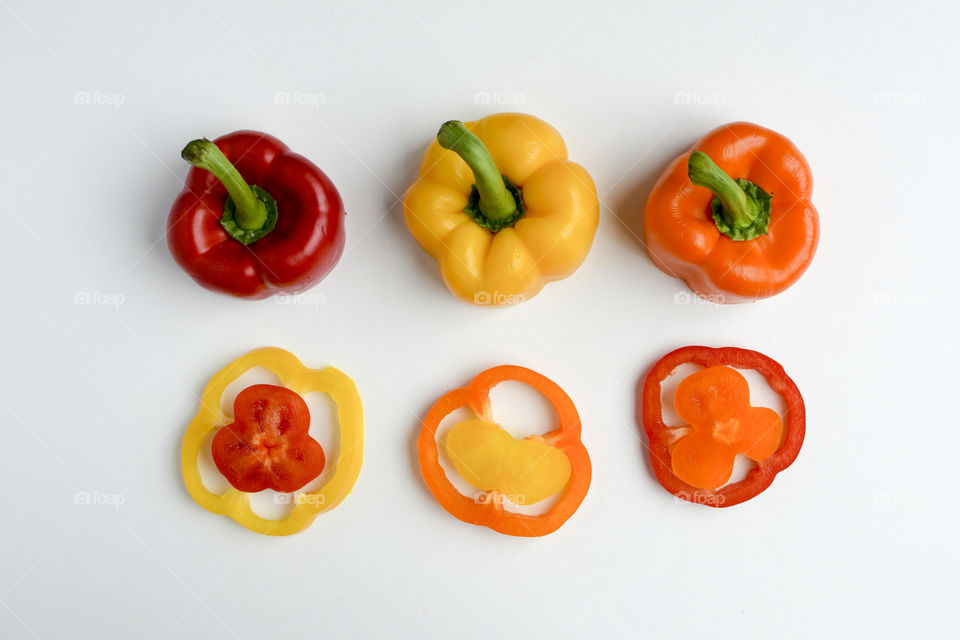 Varieties bell peppers on white background