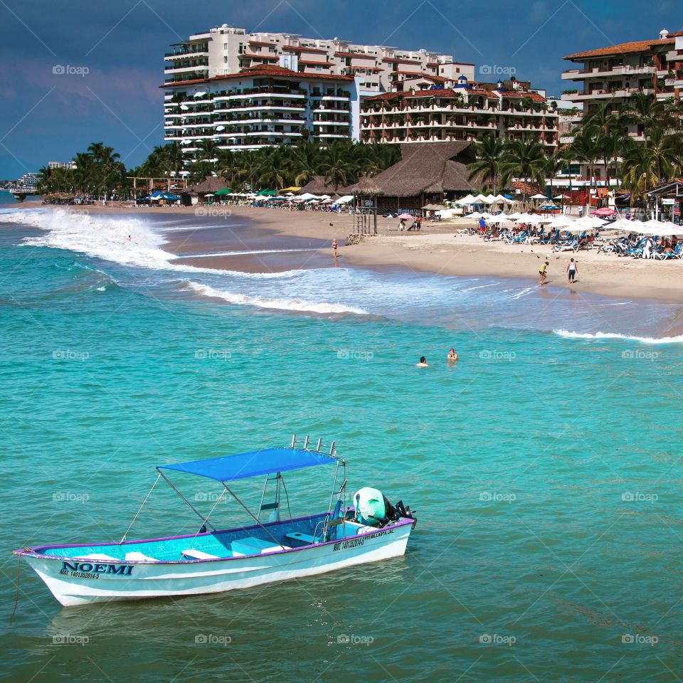 Panga boat moored in the Bay of Banderas, Puerto Vallarta, Mexico.  