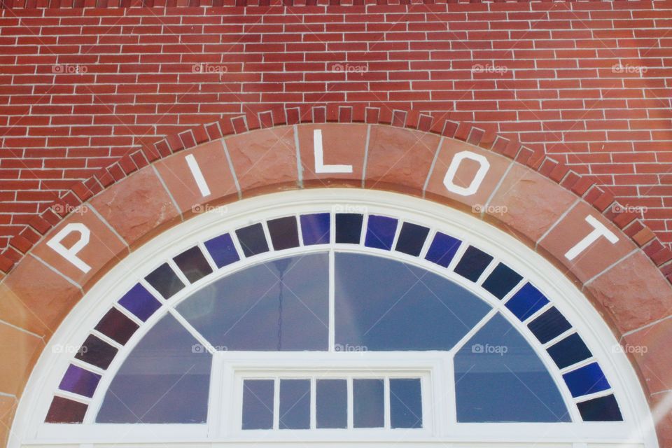 Architectural detail on the entrance of an historical building, now office space